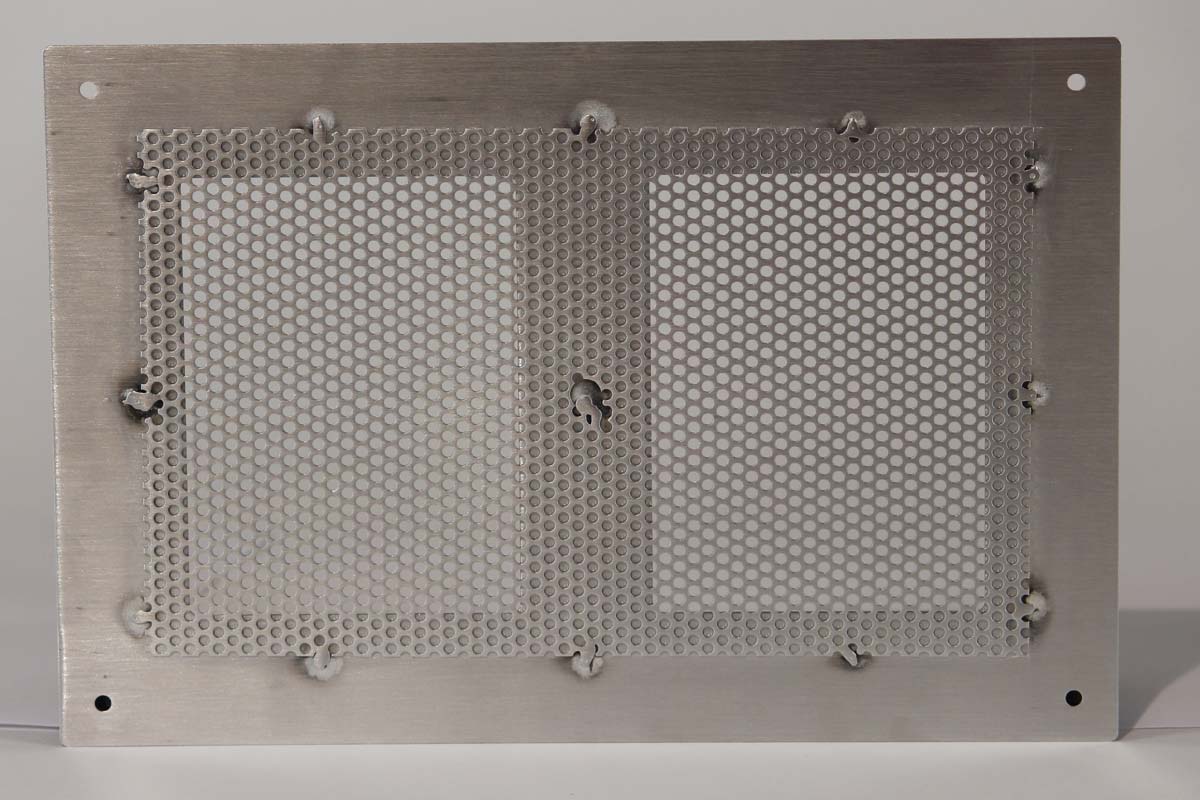 Backside of Perforated Aluminum Sheet Metal with Grained Finish, Fastened via Spot Weld